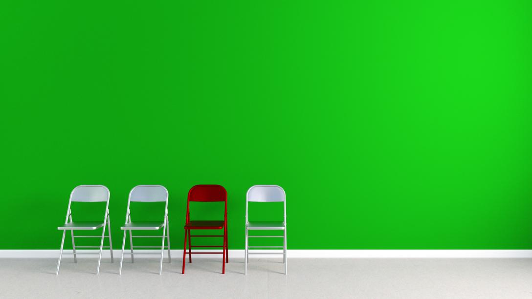 Empty recruitment chairs set for candidates, indicating social distancing business practices in 2020.